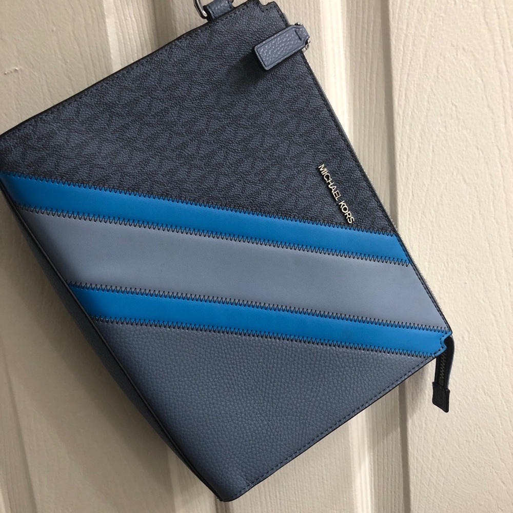 Michael Kors Blue Messenger Bag with Textured Surface and Diagonal Stripe Design